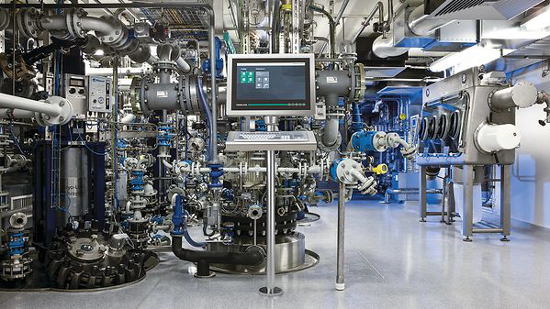 Industrial-control-room-with-machinery-setup