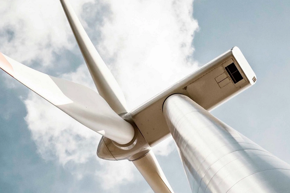 Wind turbine in retro colors with added grain