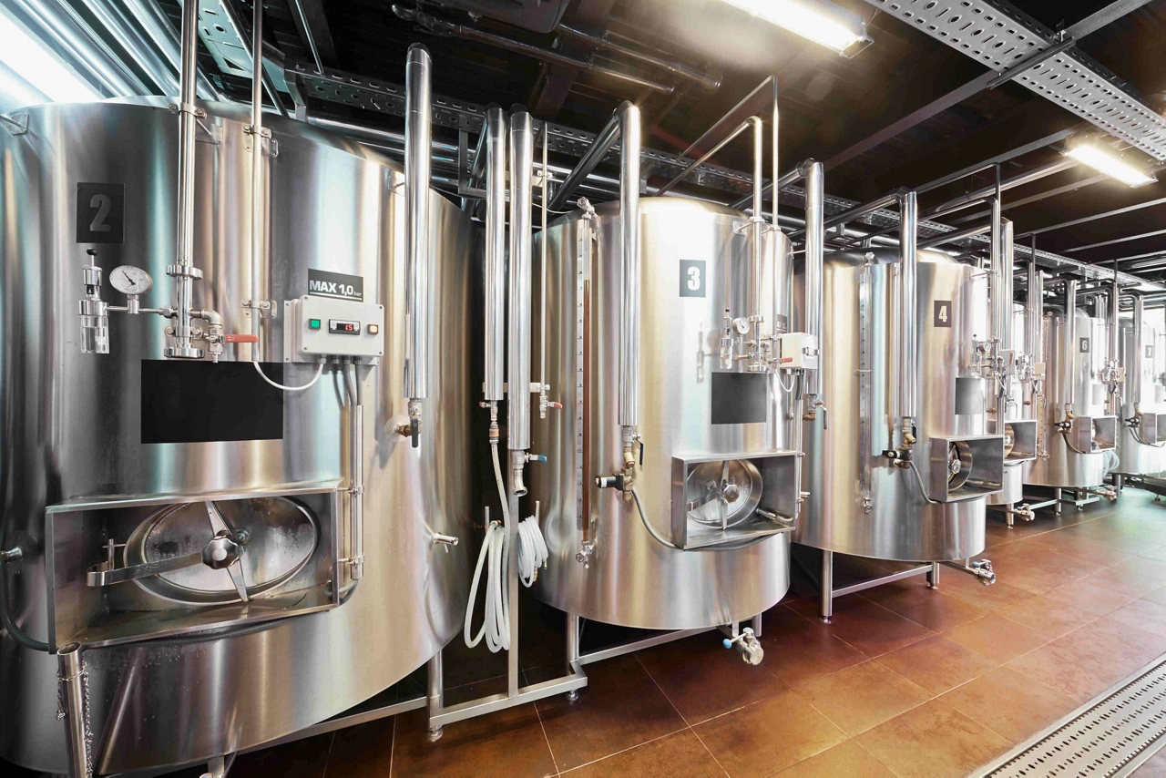 Row of tanks in microbrewery