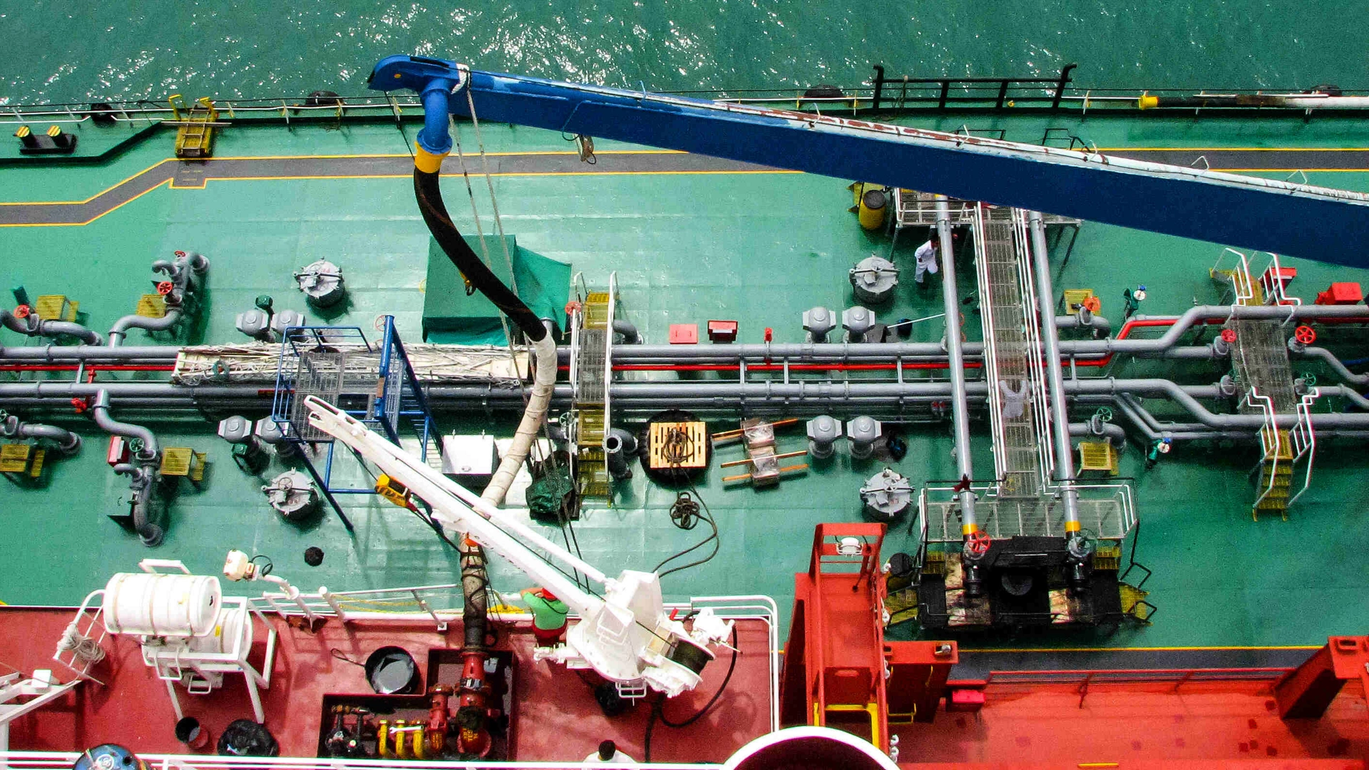 Bunkering tanker container ship in port close up