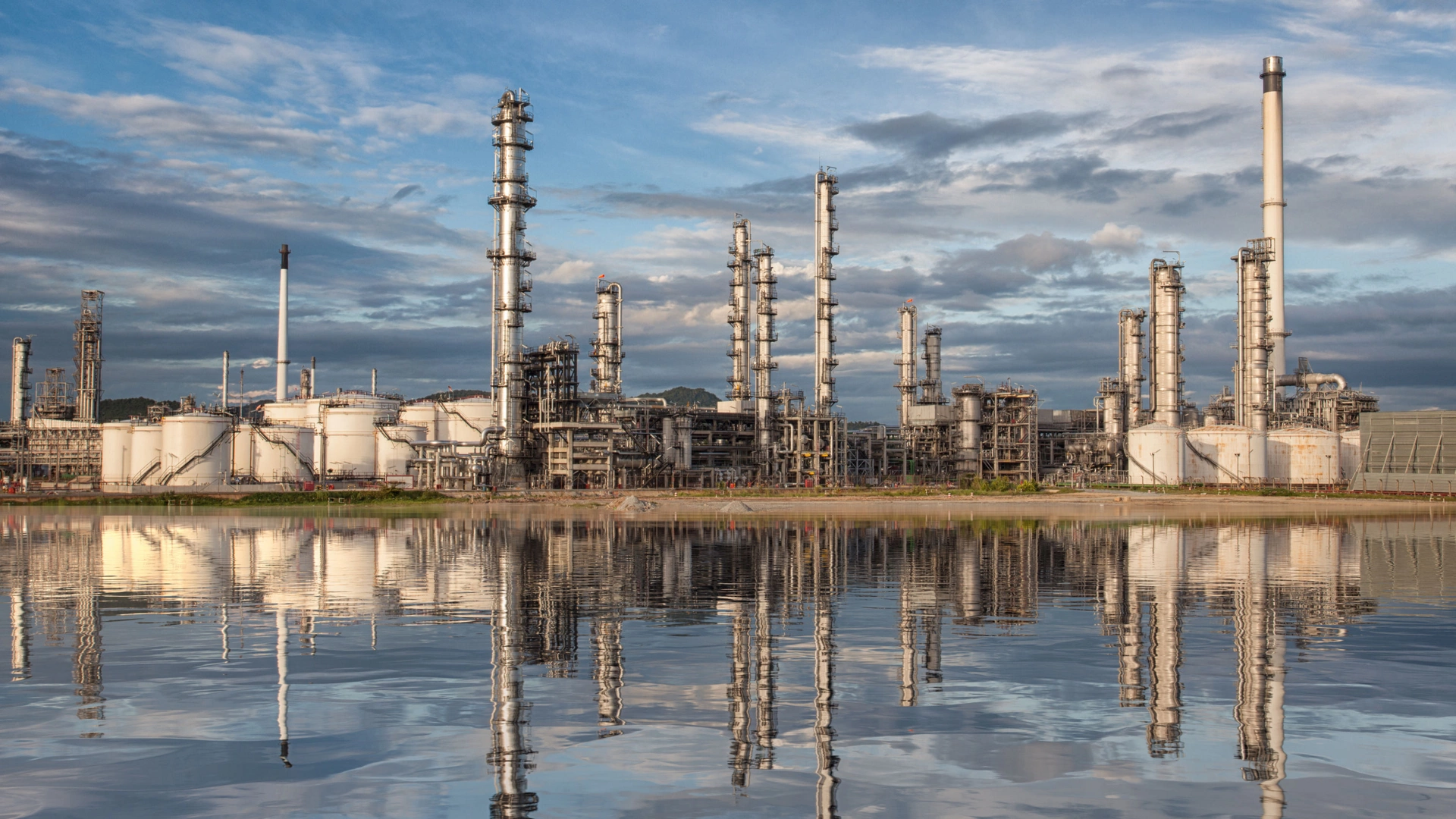Reflection of oil refinery factory, chamical plant and enrgy concept