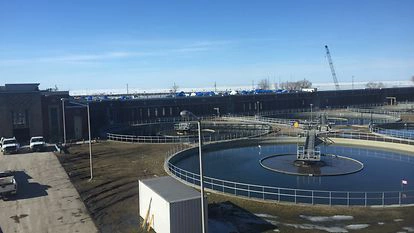 Top-down view of water tanks at a water treatment plant
