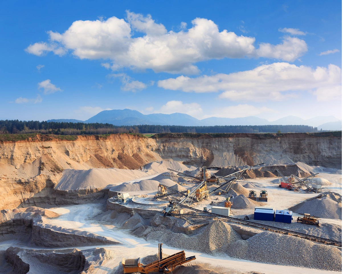 Rock quarry with trucks and all equipment.
