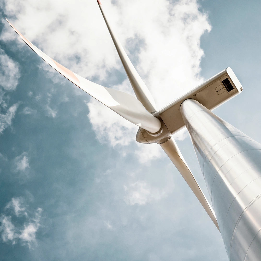 Wind turbine in retro colors with added grain