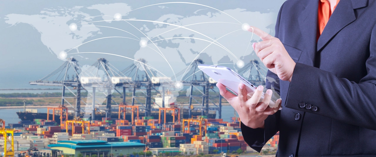 hand presses on world map with digital tablet,Industrial Container Cargo freight ship  at dusk for Logistic Import Export background (Elements of this image furnished by NASA)